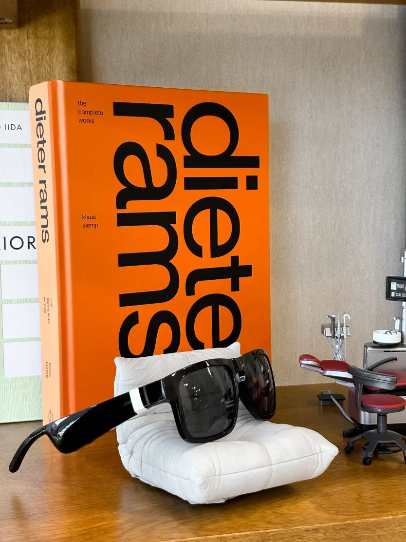 Patient wearing Bose Frames audio glasses during treatment