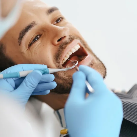 Patient watching Netflix during a filling at mend dental